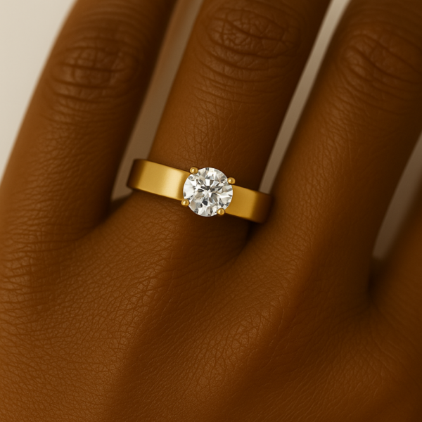 Yellow gold solitaire engagement ring with round stone and wide band, handcrafted in Ghana by JogoJewel