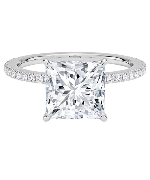 Princess-cut solitaire engagement ring on dark hand model, pavé band white gold design by JogoJewel, Ghanaian fine jeweler